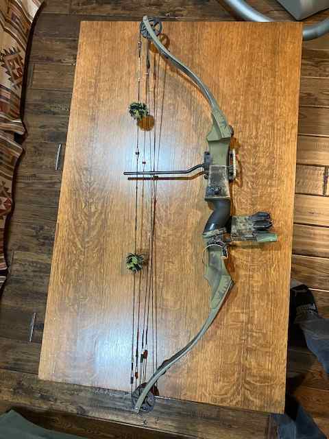 Left-handed Bear Super Mag 44 Bow with accessories