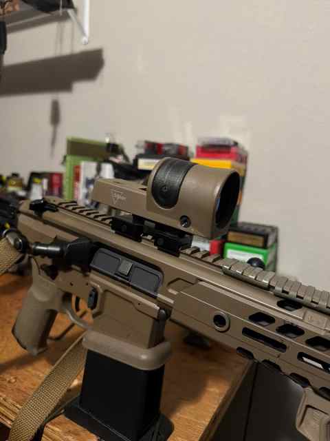 Trijicon. Brass. Powder. Bullets. Rings. 